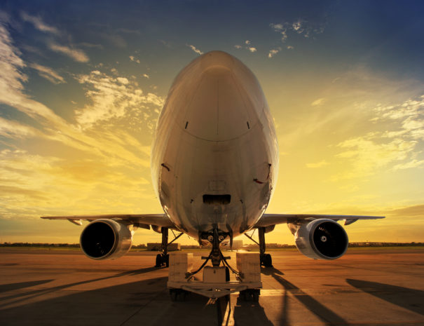 Airplane at sunset - back lit